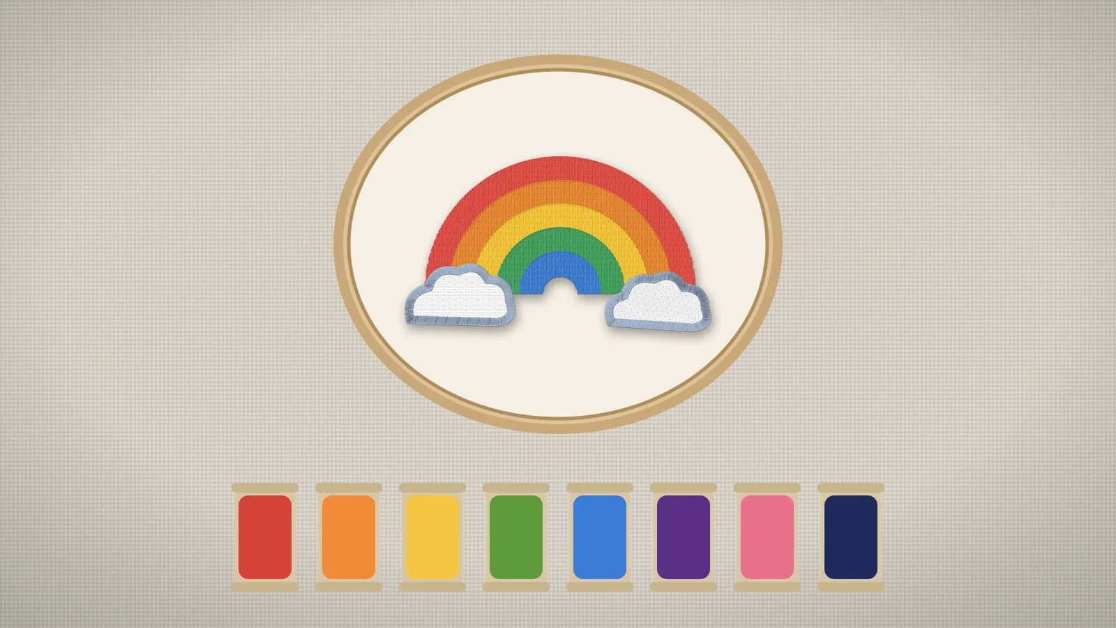 A stitched rainbow in an embroidery hoop above a row of thread color swatches
