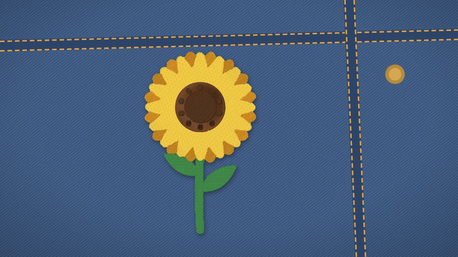 A blue denim jacket with a sunflower embroidered on it